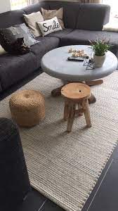 woonkamer ronde salontafel kloostertafel met bijzettafel teak en jute poef van xenos woonkamer huisinrichting jute poef