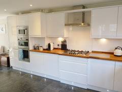 Wooden worktops need regular oiling or waxing to protect it against stains and possible beware of too many sparkles you may grow tired of it quickly, instead opt for a classic white, cream or grey. What Colour Cabinets Go With Wooden Worktops Don T Say Cream Houzz Uk