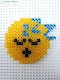 Apprenez à repasser des perles à repasser pour que les motifs ne se défassent pas et tiennent bien! Petit Panda Fait De La Peinture Creations Emoticones En Perles A Repasser Hama
