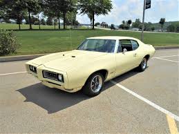 Image result for Canary Yellow 1968 AC Cars