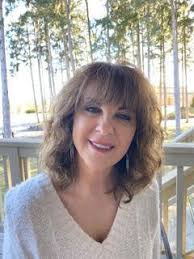 ABOUT US — 100 Caring Women