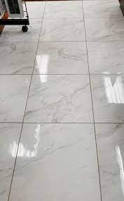 feast your eyes on marble look porcelain tile porcelain tile floor living room tile floor living room floor tile design