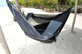 If you like to comfortably swing between two trees without an insect bite on you, this might just be the right hammock. Amazon Com Hammock Bliss Sky Bed Bug Free Insect Free Hanging Tent That Hangs Like A Hammock But Sleeps Like A Bed Unique Asymmetrical Design Creates An Amazing Lay Flat Camping