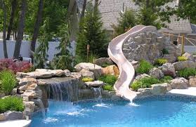 Love This Natural Swimming Pool Definitely Need A Natural Rock Water Slide To Go With It Description Fro Luxury Swimming Pools Backyard Pool Pool Landscaping