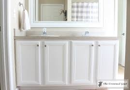 Now comes the fun, it's time to paint the bathroom cabinets! Diy Painting Bathroom Cabinets Painting Inspired