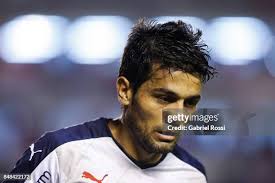 Jonas Gutierrez of Independiente drives the ball during a match... News  Photo