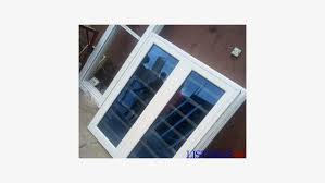 The seal, attached around the edges of the moving sash, ensures that the unit is airtight. White Aluminium Casement Window With Burglary And Net Lagos
