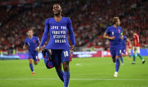 England winger raheem sterling ripped off his shirt after scoring against hungary in a world cup qualifying match on thursday to pay tribute . Ujogi 5a2qphqm