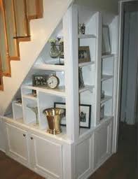 Under stairs storage with four sections, 2 x hinged doors, and 2 x pull out shelves. 13 Storage Ideas To Maximise The Use Of The Area Under Your Stairs Diy Doctor