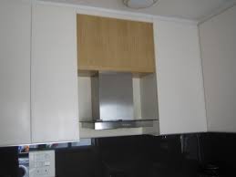 Kitchen Cabinets In Off White Acrylic Finish Shutters And Dark Brown Toughened Glass Dado Kitchen Cabinets Kitchen Cabinet