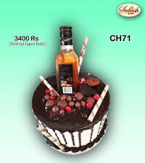 50 most beautiful looking bottle cake design that you can make or get it made on the coming birthday. Chocolate With Liquor Bottle Cake Subash Bakery