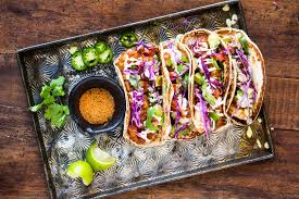 Heat tortillas according to package directions. Shrimp And Fish Tacos Tableanddish