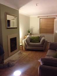 Overtly Olive Fireplace Feature Wall Green Natural Wood Olive Living Rooms Feature Wall Living Room Green Furniture Living Room