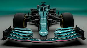 But ads are also how we keep the garage doors open and the lights on here at autoblog. Aston Martin F1 Car Images First In 61 Years Sebastian Vettel Lance Stroll