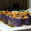 Usually, hilsa is the fish that is cooked in a brinjal curry. 1