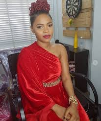 Here are times she was too pretty for words. Photo Chidinma Ekile Beautiful In Colourful Dress Hairstyle