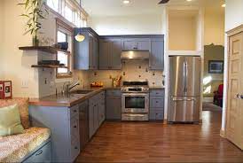A modern kitchen island in chrome or painted in a deeper or contrasting colour to the wall cabinets will make it a focal point in a grey kitchen. 10 Things You May Not Know About Adding Color To Your Boring Kitchen Freshome Com Kitchen Remodel Eclectic Kitchen Kitchen Layout