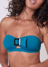 Le maillot de bain (ou le costume de bain en suisse et au québec) est un vêtement destiné à cacher certaines parties du corps lors de la pratique de la natation, de la baignade, de la détente au bord de l'eau (plage, bronzage…) ou, plus généralement. Soutien Gorge Bandeau Maillot De Bain Simone Perele Loulou
