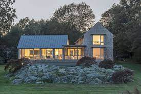 At home in new england: These Architects Put A Fresh Spin On New England Beach House Design Beach House Design New England Farmhouse Beach House Exterior
