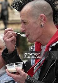 Greg Cousins samples traditional "gruel", the porridge-like meal... News  Photo