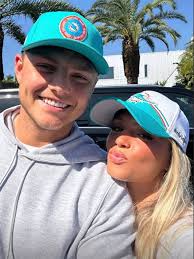 Zach Wilson joined by fiancée at Dolphins signing after bachelorette party 