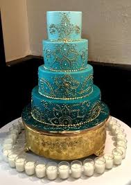 Blue Ombre Indian Wedding Cake With Gold Mehndi Designs And A Gold Base Makes For A Modern But Elegant Indian Wedding Cake Cool Wedding Cakes Indian Cake Wedding Cake Designs
