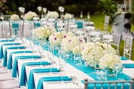 The bride got in touch with her creative side and made all of these signs to line her aisle and add to her reception decor. Turquoise Wedding Reception Tablescape Inspiration Wedding Decor Elegant Blue Themed Wedding Turquoise Wedding