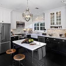 White Upper Cabinets And Black Bottom Cabinets With French Island Kitchens Without Upper Cabinets Kitchen Remodel Traditional Kitchen Remodel
