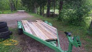 Old Boat Trailer I Turned Into A Utility Trailer With Scrap Lumber Utility Trailer Wooden Boat Plans Boat Trailer