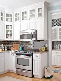 The hardwood flooring looks perfect with the kitchen's style as well. White Kitchens We Love Better Homes Gardens