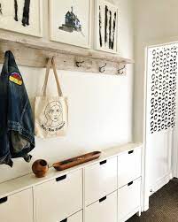 Elaine Gaito S Toronto Home Tour Is Filled With Local Art And Old Records Entryway Storage Small Hallways Hallway Storage