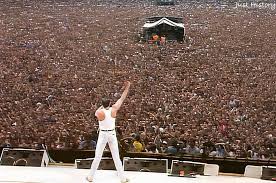 Queen's 21-minute performance at Live Aid on July 13, 1985, is widely  considered one of the greatest live performances in rock history,  captivating a stadium of 72,000 people and an estimated 1.9