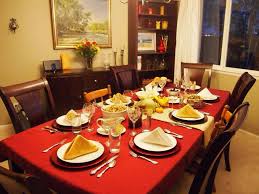 Simple Christmas Table Setting Red Chargers Red Table Cloth White Plates Gold Napkins Christmas Table Decorations Dining Table Setting Table Decorations