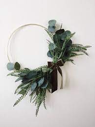 Wreaths are a great way to really brighten up your home and get it ready for the they create a modern and earthy feel to a wreath. Modern Wreath Eucalyptus Wreath Minimalist Wreath Hoop Etsy Modern Wreath Diy Wreath Christmas Wreaths