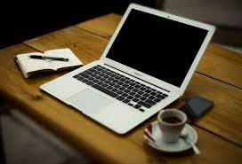 Besides holding books and knick knacks, bookcases can be used as coffee bars too. How To Set Up A Home Office With A Cafe Like Atmosphere