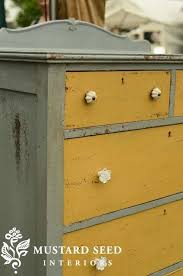 Scour flea markets or secondhand shops for a piece that's solid wood with a stained finish. Blue And Yellow Yellow Painted Furniture Distressed Furniture Painting Distressed Furniture