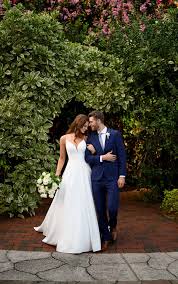 Between all the food, toasts and dancing, your wedding dress may not make it out of your ceremony and reception in pristine shape. Clean Dove Satin Ballgown With Sheer Back Essense Of Australia Wedding Dresses