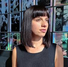 A long bob haircut with clean lines and a beautiful glossy finish! Created  by our Colourist & Stylist @gilinoyorks • • @mogeenamsterdam  @authenticbeautyconcept.nl • #bob #fringelook #perfectbob #haircutidea  #kapperamsterdam