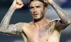 (born 2 may 1975) is an english footballer who currently plays in midfield for beckham's tattoo of jesus, which is on his torso, is taken from the painting the man of sorrows by. David Beckham And His Tattoos Tattoo Com