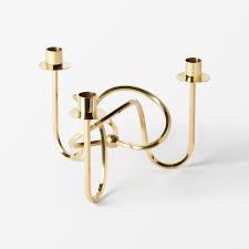 When you choose your candle, make sure it will fit in the top of the pipe. Candle Holder The Knot Of Friendship 1938 Brass Josef Frank Svenskt Tenn