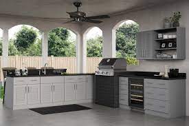 Use a gloss or semigloss latex enamel paint for your paint cabinets. Ideal Cabinetry Adds Rustic Gray To Its Outdoor Polymer Cabinets Woodworking Network