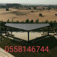مظلات خشبيه ظلال الخليج بالرياض 0558146744 تركيب مظلات برجولات حديد على شكل خشب بلاستيك صناعي للحدائق للمنازل بالرياض wooden awning outdoor installation