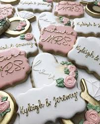 These scrumptious hand decorated sugar cookies are made from the same recipe as our traditional sugar cookies, but are just a little smaller making them the perfect cookie favor for any party or event. Handpainted Decorated Sugar Cookies By Bakes By Lo Decorated Cookies For Engagement Party M Bridal Shower Cookies Bridal Shower Brunch Bridal Shower Rustic
