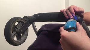 Push grey button down to deactivate lock. How To Disassemble The Front Wheel Housing Mechanisms On An Uppababy Vista Youtube