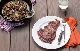 When grilling steak, good chefs always recommend you oil the meat, not the grill. Grass Fed Kitchen Rib Eye Steak With Caramelized Mushrooms And Onions Paleo Meat Recipes Paleo Meats Paleo Recipes