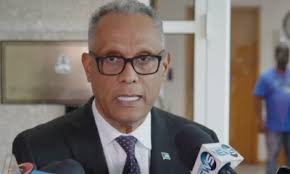 Minister of Health and Wellness Dr. Michael Darville Archives