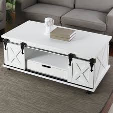 Gracie Oaks Magnus Wheel Coffee Table With Storage Wayfair In 2020 Coffee Table Coffee Table With Storage Wooden Coffee Table