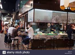 Les halles is a large, covered gourmet market where you'll have the opportunity to ogle and sample an enormous variety of products, all of absolutely top quality, from seafood and produce to meats, pâtés, sweets, and especially cheeses. Meeresfruchte Restaurant Les Halles De Lyon Paul Bocuse Gourmet Markt Lyon Rhone Alpen Frankreich Stockfotografie Alamy