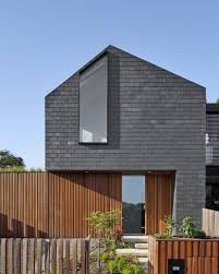 Shop wood and metal bars. Biophilia Slate House Northcote Melbourne Design Studios Archello