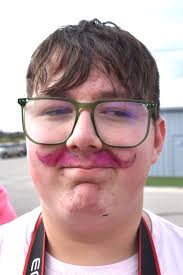 The kids are finishing their floats for the parade.